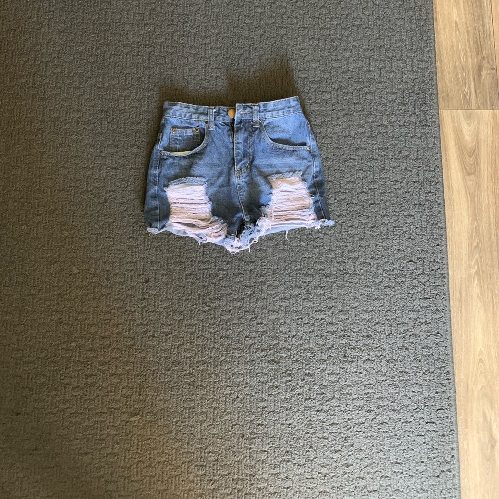 Distressed denim shorts